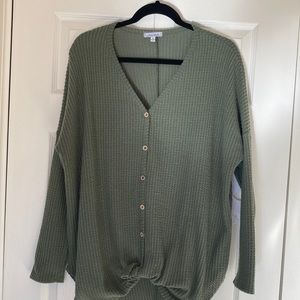 Green, white birch sweater. Waffle knit. Tie front, slightly longer in back.